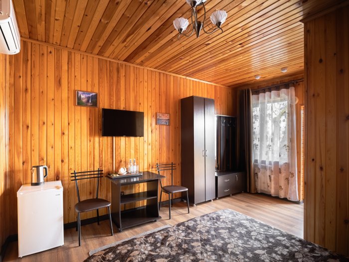 A hotel room on the riverbank with a barbecue area - Country Recreation Club «Usadba Familia» | Photo 2